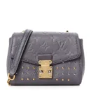 Superfake Louis Vuitton Handbag with Silver Studded Details